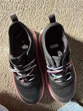 Black Athletic Sneakers with Pink Soles and Multicolor Laces